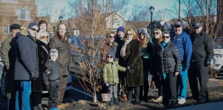 More than a dozen people of all ages gathered to pay tribute to Arthur Swartz, a longtime Rotarian. (Photo by Janelle Clausen)