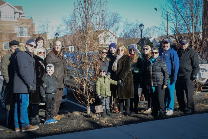 More than a dozen people of all ages gathered to pay tribute to Arthur Swartz, a longtime Rotarian. (Photo by Janelle Clausen)