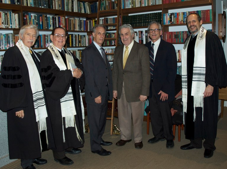 Arthur Flug speaks at Kristallnacht service at Emanuel