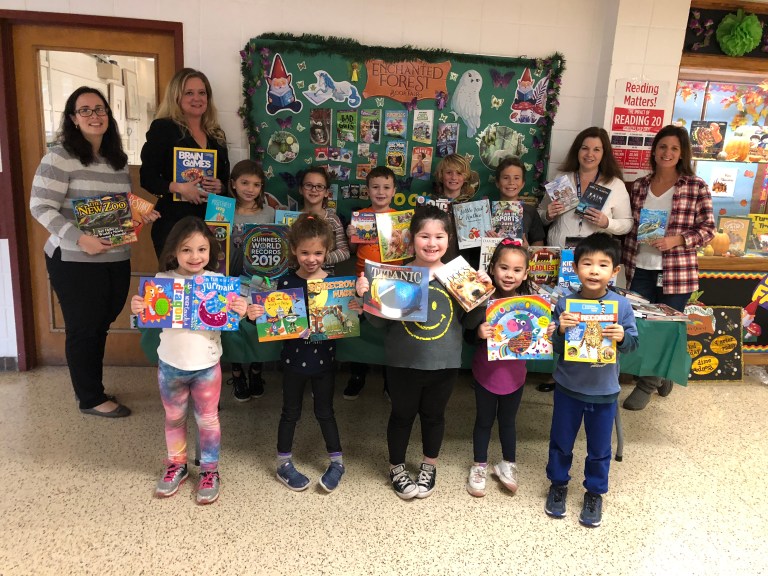 Guggenheim Elementary holds coin drive for books