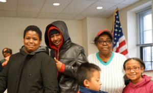 Friends and families enjoyed spending a morning helping people in need. (Photo by Grace Tan)