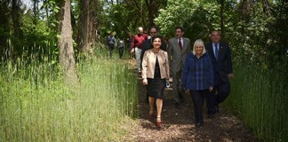 Town officials walk along the Hempstead Harbor Shoreline Trail, which they hope to expand. (Photo courtesy of the Town of North Hempstead)