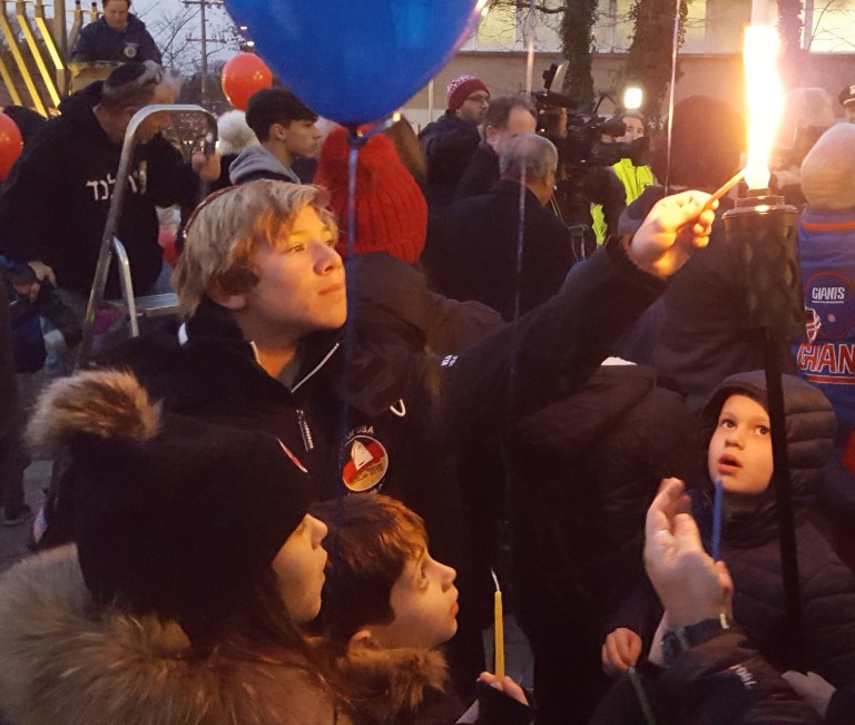 Rabbi, councilwoman praise religious freedom at Manhasset menorah lighting