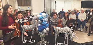 Musicians from North High School visited the Atria to perform for its residents. (Photo courtesy of the Great Neck Public Schools)