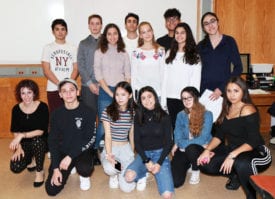 North High theatre teacher Ilana Meredith with students from her acting and improv classes who performed original skits about mental health issues for ninth graders. (Photo courtesy of the Great Neck Public Schools)