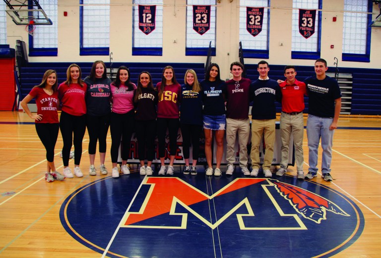 Twelve from Manhasset sign on to play college athletics