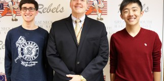 South High School Principal Dr. Christopher Gitz congratulates Noah Sheidlower and Andersen Gu. (Photo courtesy of the Great Neck Public Schools)