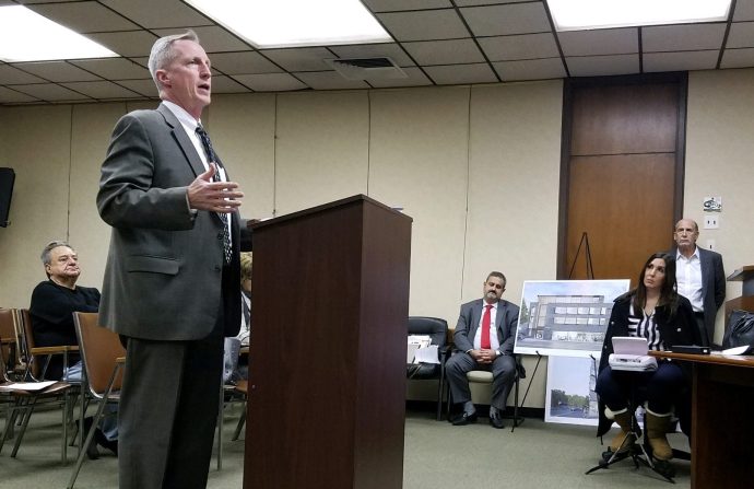 Christopher Prior, an attorney representing developers for 16 Maple Drive, presented a case for the four-story mixed use building. (Photo by Janelle Clausen)