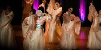 A group of women perform "Dream into Shangri-la" as part of the Great Neck Chinese Association’s annual Lunar New Year celebration. (Photo by Demi Guo)