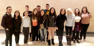 North High Choir members are pictured here with Pamela Levy, North High Department Chair for Performing and Fine Arts, South High graduate Giovanni Xu, marketing director at NYCO, and South High graduate Jessica Fishenfeld, opera singer at NYCO. (Photo courtesy of the Great Neck Public Schools)