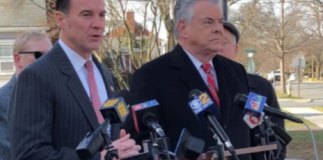 Tom Suozzi and Peter King discuss newly introduced legislation to repeal the limits on state and local tax reductions. (Photo courtesy of Rep. Tom Suozzi's office)