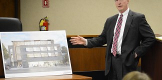 Chris Prior, a legal representative for Spiegel Associates, presents an artist's rendering of its proposed 16 Maple Drive development. (Photo by Janelle Clausen)