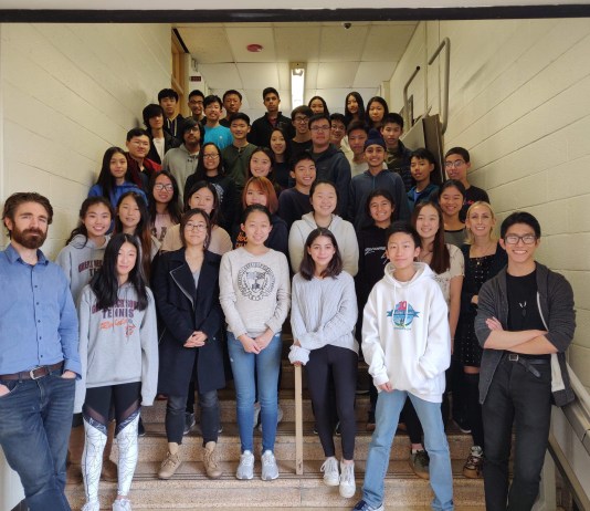 Members of the South High School Science Olympiad team are photographed with team advisors Dr. James Truglio and Nicole Spinelli. (Photo courtesy of the Great Neck Public Schools)