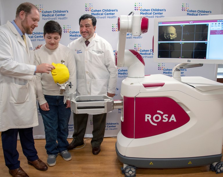 Teen meets ROSA, the robot that helped treated his crippling seizures