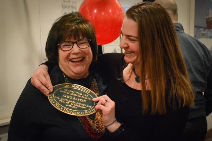 Alice Kasten and her daughter Meredith Zolty joke about how Kasten, who received a plaque normally given only to historical landmarks or buildings, is now a "landmark." (Photo by Janelle Clausen)