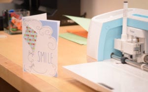 The Cricut, with the help of design software, created a card and name tags. (Photo by Janelle Clausen)