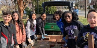 Students participated in beautifying three gardens at the Centennial Gardens.