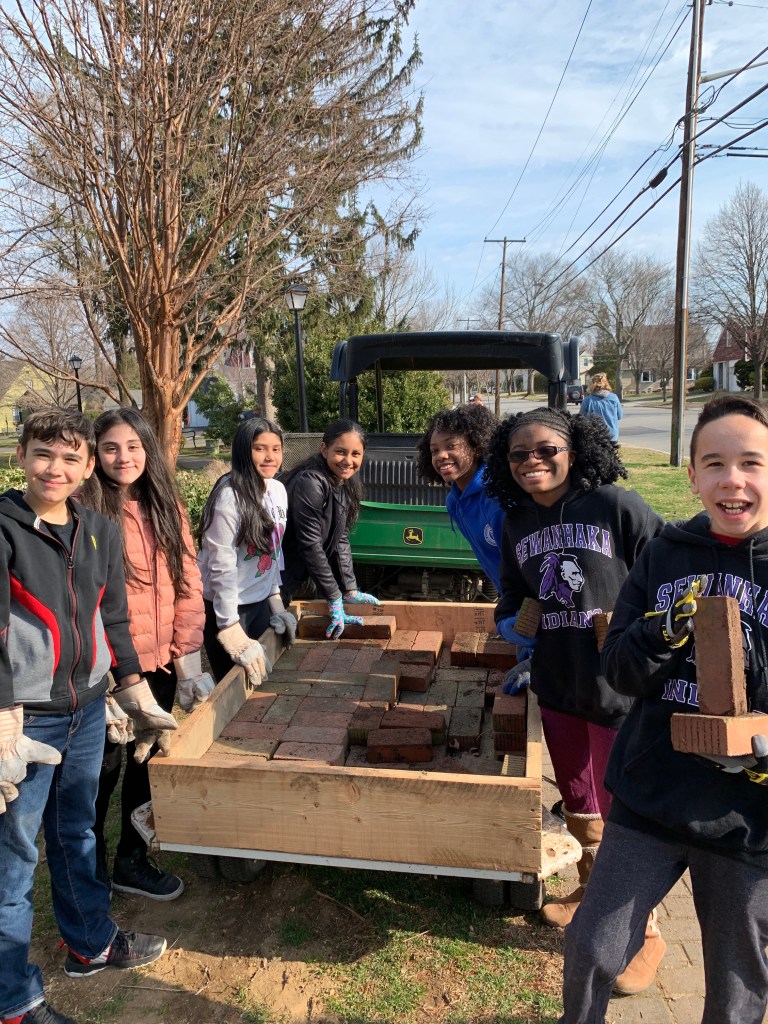 Sewanhaka students spruce up Centennial Gardens