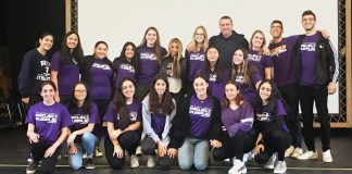 North High School recently hosted their annual Project Purple Week, sponsored by the school’s Students Against Destructive Decisions (SADD) Club. The national Project Purple initiative aims to provide students and athletes with motivation and support to make healthy choices and deter them from turning to drugs and alcohol to cope with life’s challenges. This year’s program at North High included a visit from Project Purple founder Chris Herren, who led an assembly for ninth and tenth-grade students. His visit was made possible with support from school administrators and the North High PTO. Mr. Herren is a former NBA athlete who travels across the country to share his personal experiences with substance abuse and addiction. Mr. Herren first visited North High in November 2013 to address the entire student body, and that visit inspired the SADD Club to initiate Project Purple within the school. North High’s annual Project Purple Week activities include sharing information about substance abuse and addiction, as well as a series of morning announcements about drug trends in adolescents. Ninth-grade health classes also view Mr. Herren’s documentary in class. The North High SADD Club advisor is health teacher Lauren Mock. (Photo courtesy of the Great Neck Public Schools)