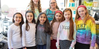 Yeshiva Har Torah held a group hair donation event on Wednesday, with students, staff and parents giving hair to an Israeli charity to make wigs for children with cancer. (Photo by Eli Schilowitz)