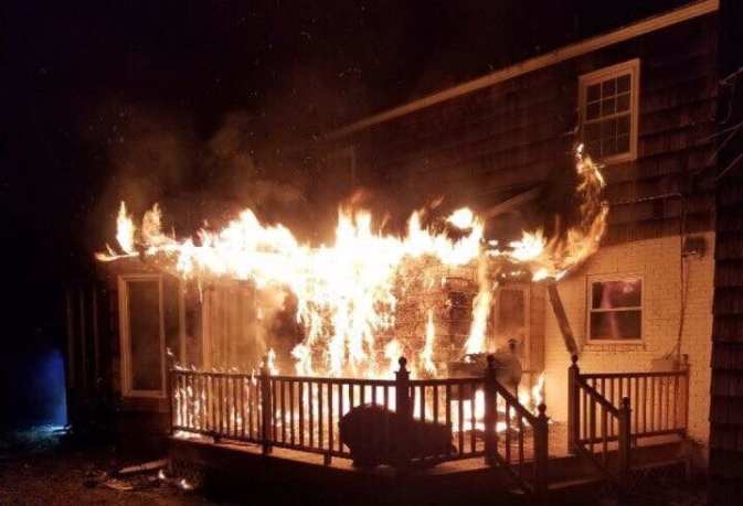 A home in Great Neck Estates suffered significant damage from a fire early Sunday morning, started by what fire officials say was a pellet fuel smoker. (Photo from Vigilant Fire Company)