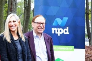 Karyn Schoenbart, chief executive officer of The NPD Group, and Tod Johnson, executive chairman of The NPD Group, provide opening remarks at this morning’s groundbreaking ceremony, which kicked-off The NPD Group’s partnership with Habitat for Humanity in Nassau County. (Photo courtesy of the NPD Group)