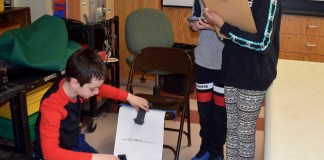 Manor Oaks School students Mateo Mrakovcic (left), Alexander Fulgieri and Meera Lal (right) teamed up to test collisions during an Energy and Collision module. (Photo courtesy of the New Hyde Park-Garden City school district)