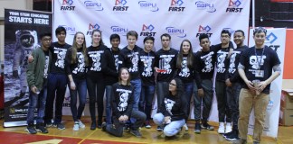 Members of Sewanhaka Central High School District’s Robotics Club are pictured with adviser Jack Chen.