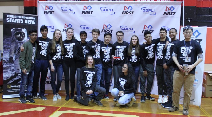 Members of Sewanhaka Central High School District’s Robotics Club are pictured with adviser Jack Chen.