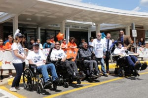 Ride for Life founder Christopher Pendergast is joined by Principal Michael Grimaldi, teacher Christopher Lynch, and fellow Ride for Life participants at the E.M. Baker School.  (Photo courtesy of Great Neck Public Schools)