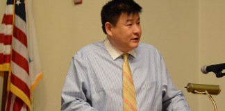 James Wu, as seen here at a Meet the Candidates event in May, said the candidate swap was necessary and not a first in the village. (Photo by Janelle Clausen)