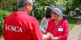 Supervisor Judi Bosworth speaks with a member of the Great Neck Chinese Association on June 9 at an annual picnic where John Motchkavtiz, Kingsley Liu and Li Chang were honored for their dedication the GNCA. (Photo courtesy of Town of North Hempstead)