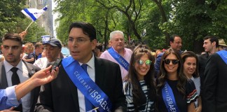 UN Ambassador from Israel, Danny Danon, marches in Celebrate Israel Parade with other UN Ambassadors and Great Neck Estates residents Lia and Dana Brody, Esq. in center, with sunglasses. (Photo courtesy of Dr. Paul Brody)