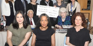 Administrators and school board trustees join Parent-Child Home Program coordinator Regina Farinaccio, Mariam Chatinover of the NCJW, PCHP participant Caroline Calderon, parent educator Sheila Bush and classroom volunteer Ilise Friedman. (Photo courtesy of Great Neck Public Schools)