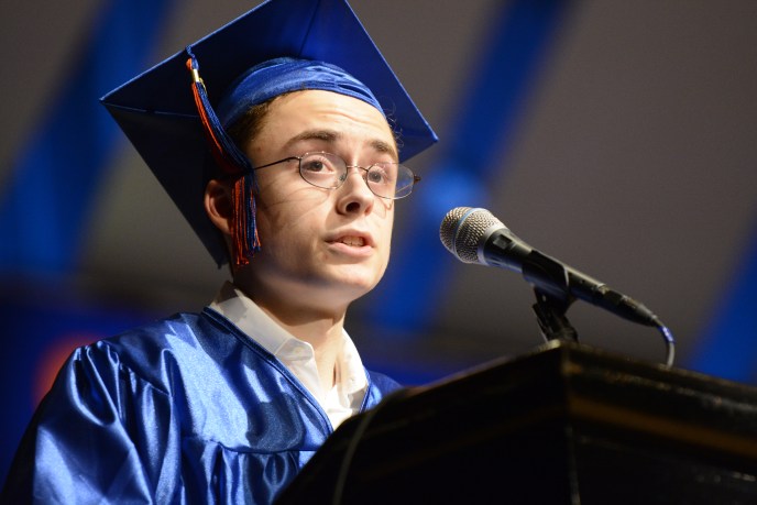 David Carbone, the "voice of Great Neck South High School," took a moment to honor the legacy of the late Sally Passarella, who he said changed his life, at commencement. (Photo by Janelle Clausen)