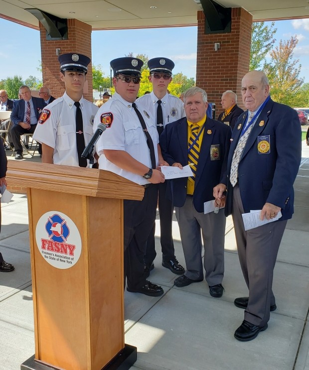 Mineola Junior Fire Department donate to the Firemen’s Home