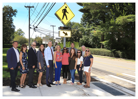 Nicolello secures pedestrian safety devices at North Side Elementary School Nicolello secures pedestrian safety devices at North Side Elementary School