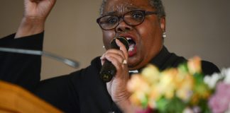 Rev. Natalie Wimberly of Clinton Memorial A.M.E. Zion Church delivered a powerful sermon on Sunday, calling on congregants to remain 'maladjusted' in the face of continued injustice in honor of Martin Luther King Jr. (Photo by Janelle Clausen)