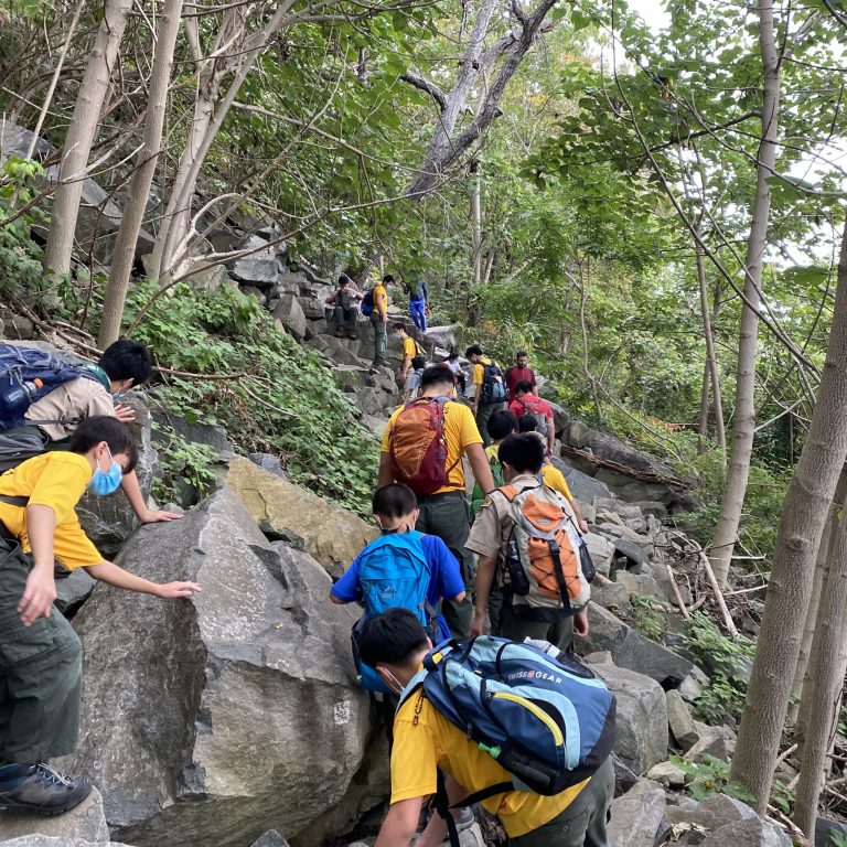 Boy Scout Troop 10 boulder scrambles ‘The Giant Stairs’ in Alpine, N.J.