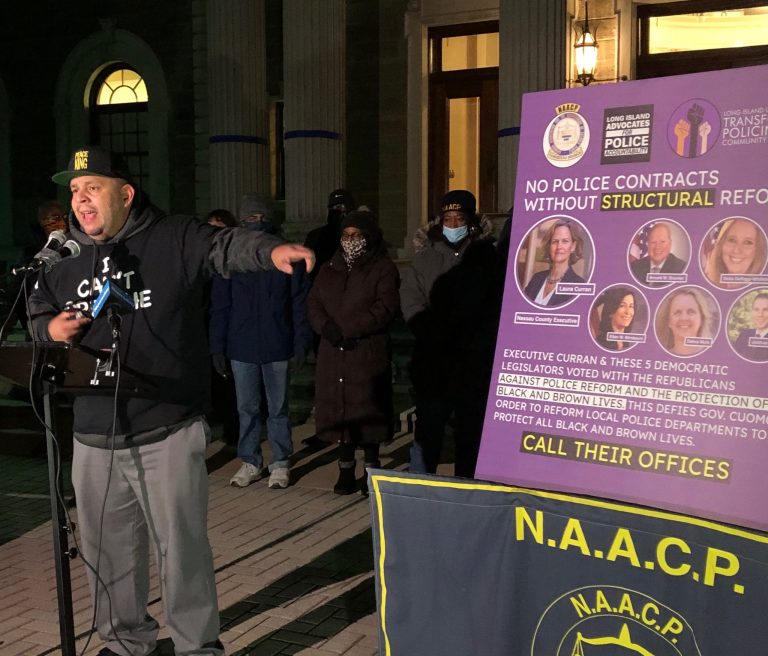 More than 100 demand police reform outside Nassau County legislative building