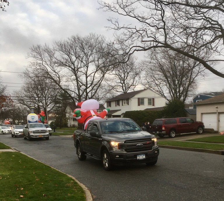 Holiday car parade brightens up several communities