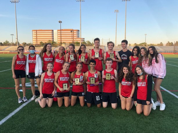 Eight Wheatley High School athletes claimed county championships in cross country, track and field, with two races breaking school records. (Photo courtesy of East Williston School District)