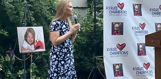 Jacqueline Franchetti speaks to a crowd on lawn of the Parent Resource Center during Kyra's Rally for Change. (Photo by Brandon Duffy)