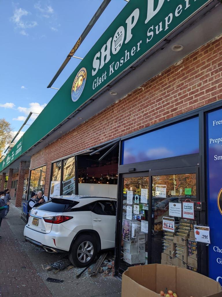 Car crashes into Shop Delight storefront in Great Neck