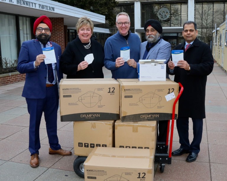 Clavin, Murray accept masks on behalf of town