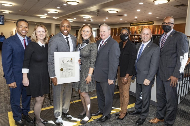 DeRiggi-Whitton congratulates Rodney Harrison at Nassau Legislature