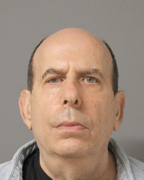 Manhasset man arrested for alleged illegal possession of nearly 20 weapons