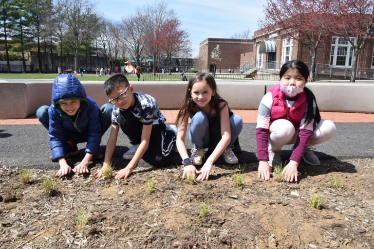 John Lewis Childs School fourth-graders plant a Pocket Prairie