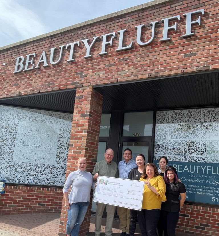 Beautyfluff brings more beauty to main street with a sign grant from the Port Washington BID