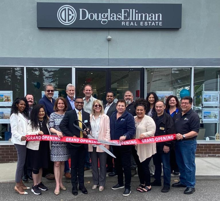 Douglas Elliman grand reopening in New Hyde Park